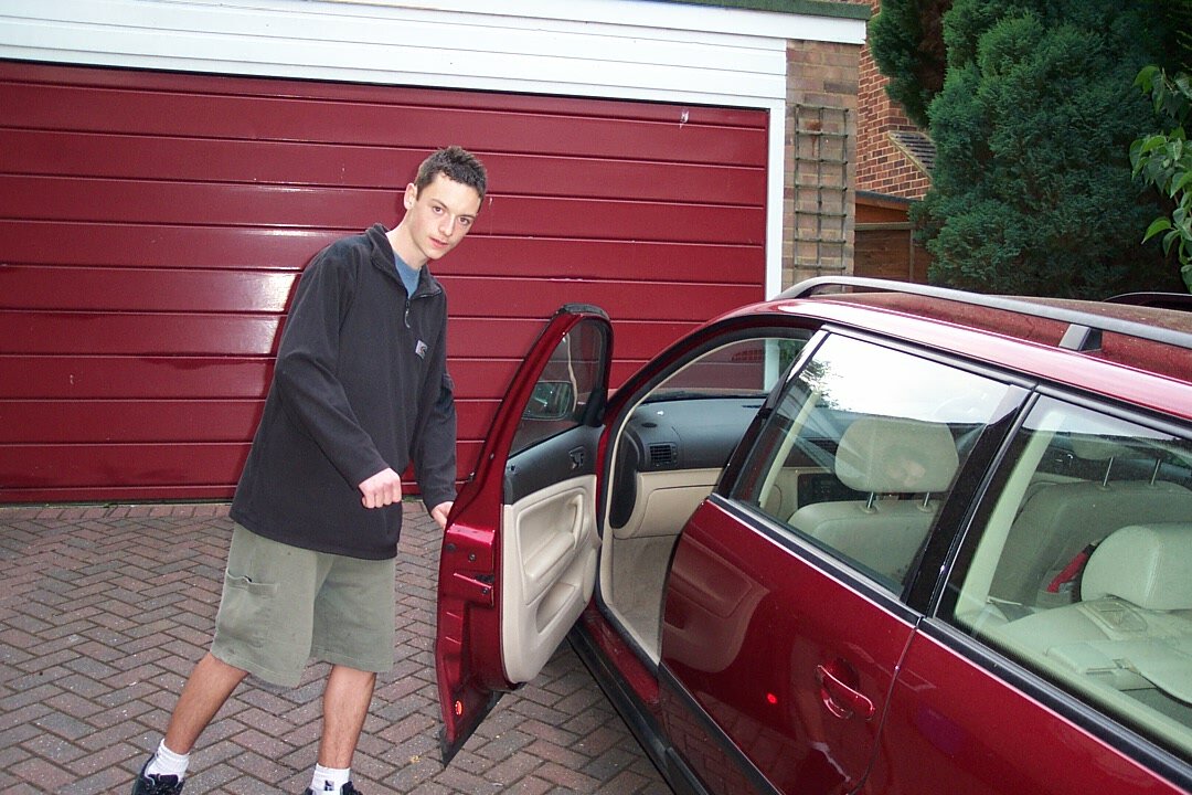 Simon getting into a car